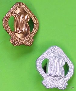 ГДР. Два спортивных значка в серебре и бронзе для детей второй возрастной категории
