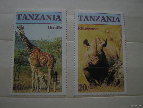 Марки - Танзания фауна жираф и носорог