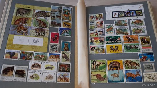 Коллекция марок  - альбом с марками по теме фауна разных стран - Азия Европа Африка Америка - альбом СССР на 28 страниц