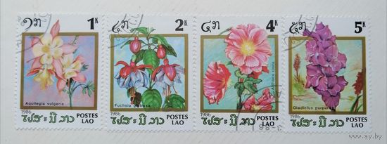 Лаос /1986/ Флора - Цветы/ 4 марки из серии