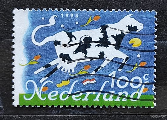 Нидерланды, корова с картами государств, символизирует экспорт