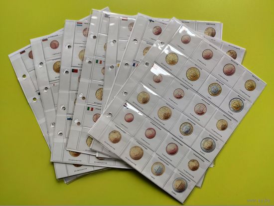 Комплект прозрачных листов с ячейками + информационных листов-разделителей для разменных монет евро (можно годовых наборов, 7 листов для 21 набора, 168 ячеек). Торг.